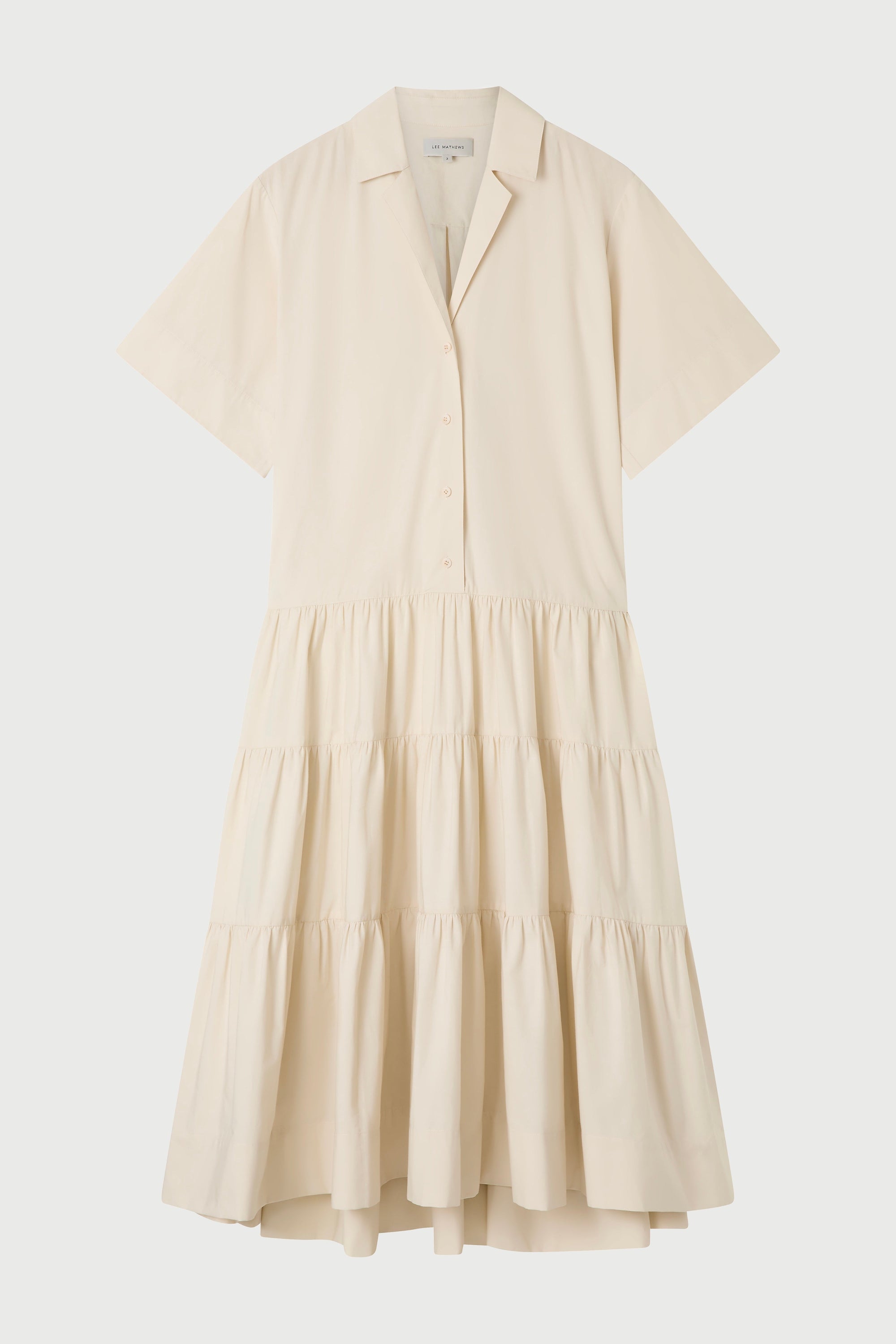 Beige dress with short sleeves on a white background