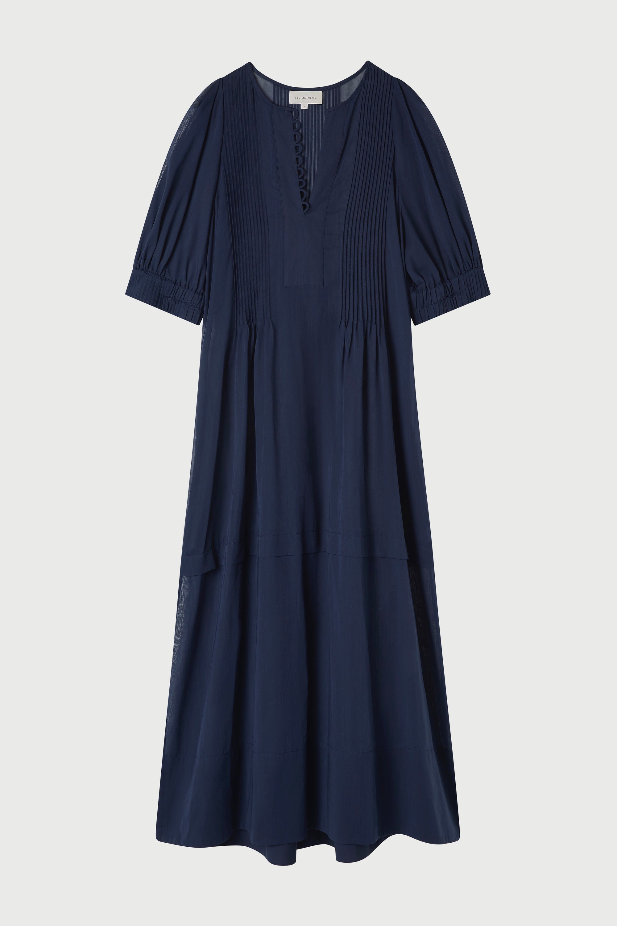 Navy blue dress with short sleeves on a light gray background