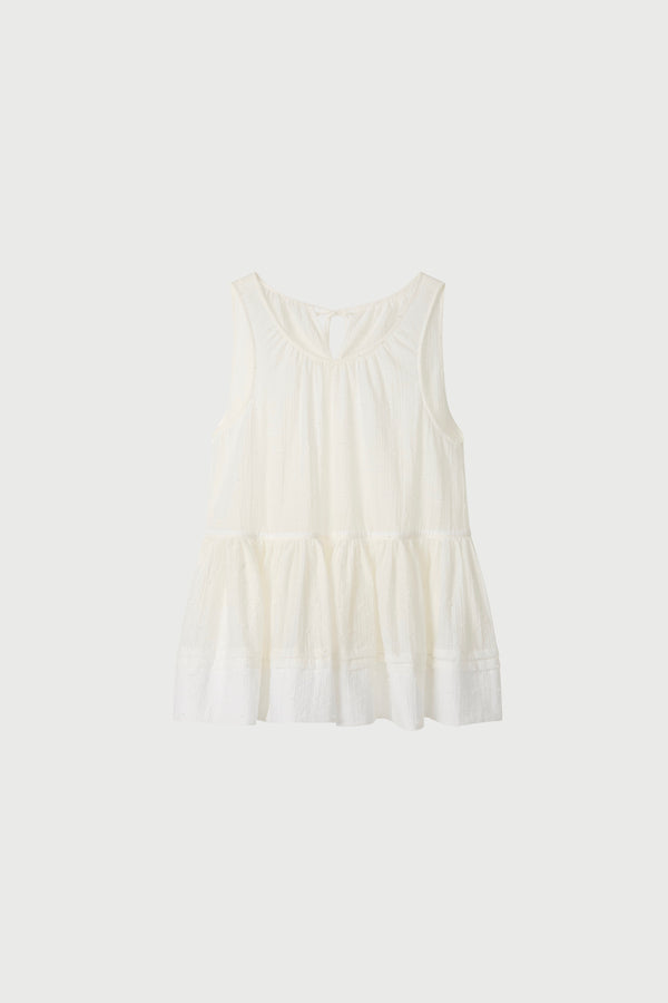 A white peplum blouse on a white background