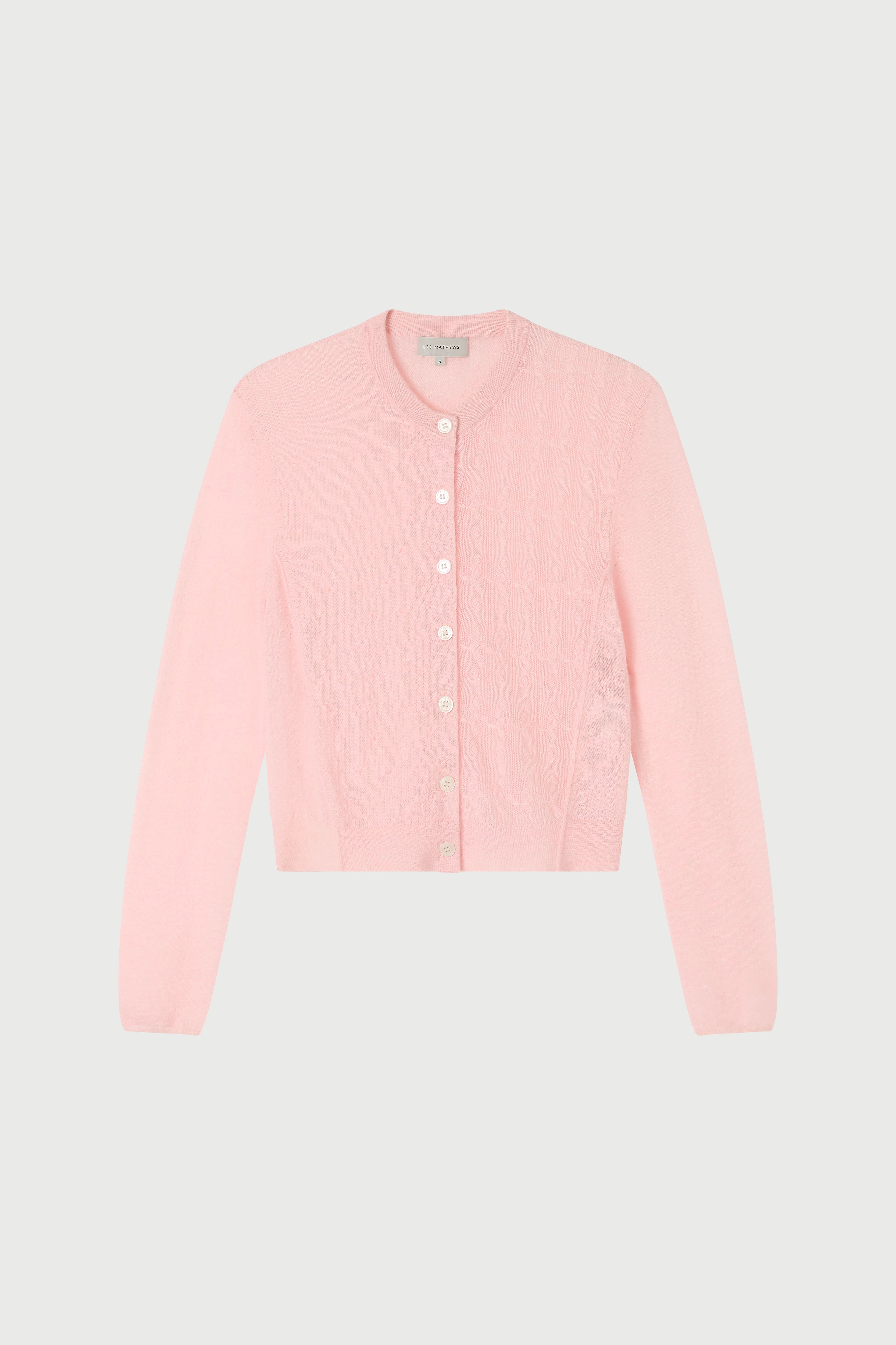 Light pink cardigan on a light gray background